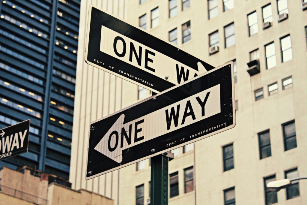 Image of a street sign reading one way. Cope with a major life change in healthy ways with the help of life transitions therapy in Austin, TX.