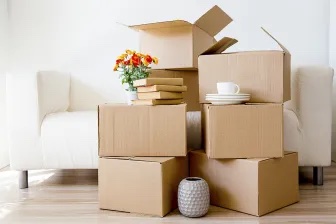 Image of boxes stacked on top of each other. Learn effective ways to cope with a major life change with life transitions therapy in Austin, TX.